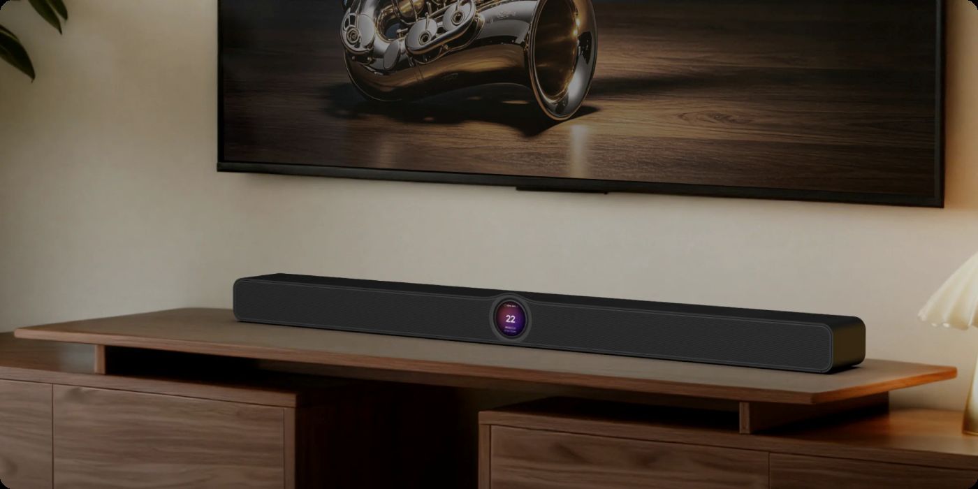 WiiM Bar placed on a TV stand with a TV visible above.